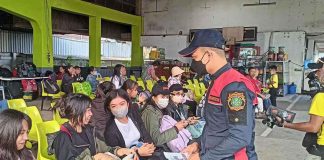 Bureau of Fire Protection Region 6 intensifies its fire prevention and fire safety awareness campaign – "OPLAN PAALALA: IWAS PAPUTOK 2022" – through rekorida, fire truck visibility, and continuous dissemination and distribution of fire safety leaflets all over the region. Photo shows a fire officer distributing fire safety leaflets to passengers in a transport terminal. BFP-6 PUBLIC INFORMATION UNIT PHOTO