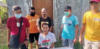 Brothers Raffy and Ronald Buenaflor (seated and standing third from left) were arrested on Tuesday, Nov. 29, 2022, in Barangay Bayuyan, Estancia, Iloilo. Both face illegal drug charges while Ronald faces an additional charge of illegal possession of firearm. ESTANCIA MUNICIPAL POLICE STATION PHOTO