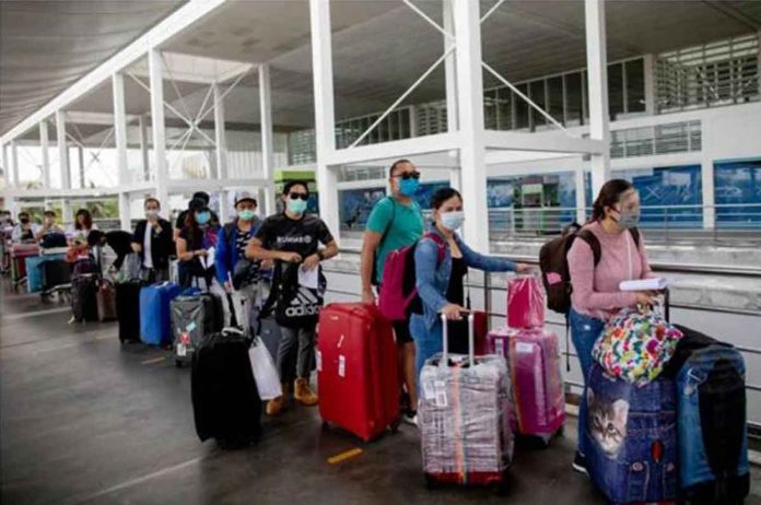 nation-OFW Repatriated overseas Filipino workers arrive at an airport after being allowed to go home following weeks of quarantine amid the spread of the coronavirus disease, in Pasay City, Metro Manila. FILE PHOTO BY ELOISA LOPEZ / REUTERS