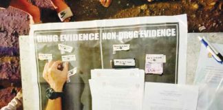 A policeman conducts an inventory of the items recovered from a buy-bust operation in Barangay San Fernando, San Jose, Antique on Dec. 13, 2022. PHOTOS FROM THE SAN JOSE DE BUENAVISTA MUNICIPAL POLICE STATION