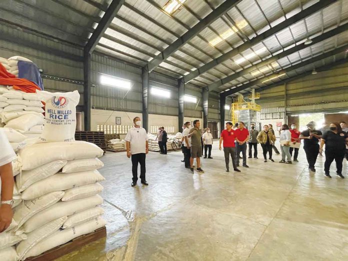 rice-supply PRESIDENT Ferdinand "Bongbong" Marcos Jr. conducts a surprise inspection of the National Food Authority warehouse in Valenzuela City on Dec. 17, 2022. @MAVGONZALES TWITTER PHOTO