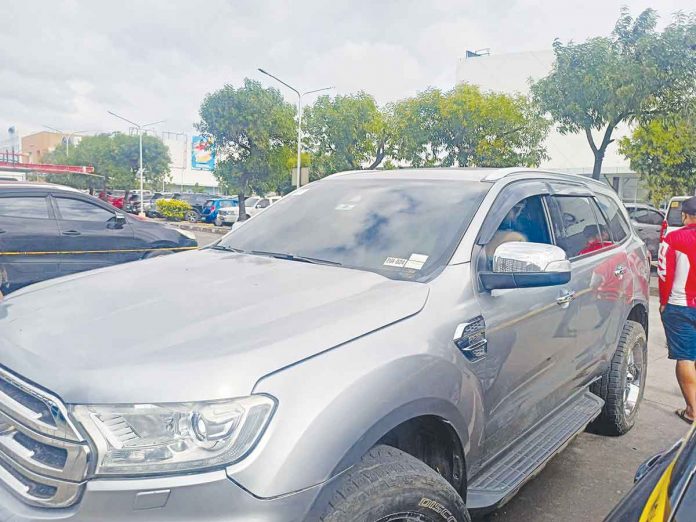 Photos show the driver's side window of a sports utility vehicle smashed during an assassination attempt by still unidentified gunmen in Bacolod City yesterday. AKSYON RADYO BACOLOD/CONTRIBUTED PHOTOS