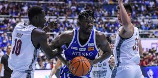 Ateneo de Manila University Blue Eagles’ Angelo Kouame protects the ball from University of the Philippines Fighting Maroons’ Maodo Malick Diouf and Carl Tamayo. UAAP PHOTO