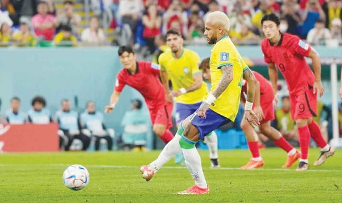 sports-World-Cup Neymar made the score 2-0 from the penalty spot after Richarlison was fouled. JIN-MAN LEE / AP