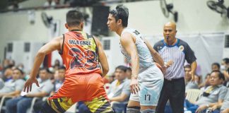 Acster Marketing’s Alwyn Alday dribbles the ball against a RA-AK Transport defender. PHOTO COURTESY OF STEPHEN TAN