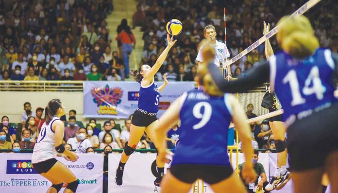 sports-ateneo Ateneo de Manila University Blue Eagles’ Vanessa Gandler with a push shot. PHOTO COURTESY OF GRID ATHLETIC COMPANY