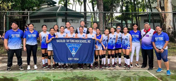 sports-bacolod Bacolod Tay Tung High School Thunderbolts elementary girls volleyball team with the coaching staff. PHOTO COURTESY OF ROBERTO CALAMBA JR.