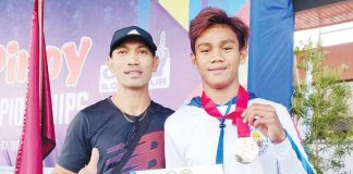 Bacolodnon hurdler Mico Villaran displays his gold medal with his head coach Miguel Arca. PHOTO COURTESY OF MIGUEL ARCA