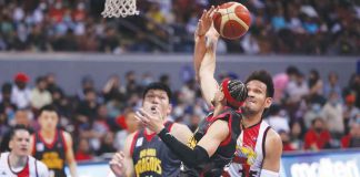 Bay Area Dragons’ Kobey Lam had his layup foiled by the defense of San Miguel Beermen center June Mar Fajardo. PBA PHOTO