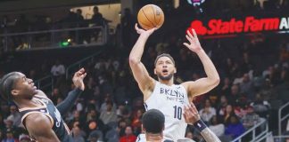 Brooklyn Nets’ Ben Simmons nearly lost control of the ball after being bothered by the defense of Atlanta Hawks' John Collins. USA TODAY PHOTO