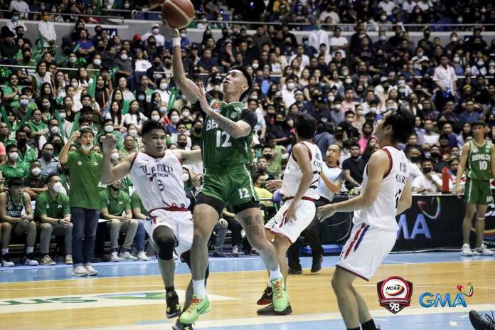 sports-csb Negrense Miggy Corteza of College of St. Benilde Blazers goes for an easy inside basket. PHOTO BY GMA SPORTS/NCAA
