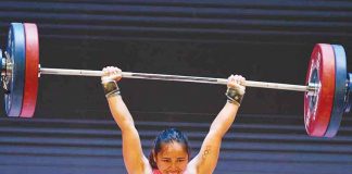 Filipina weightlifter Hidilyn Diaz-Naranjo is all smiles nailing the elusive world weightlifting championship in the International Weightlifting Federation World Championships in Bogota, Colombia. AFP PHOTO