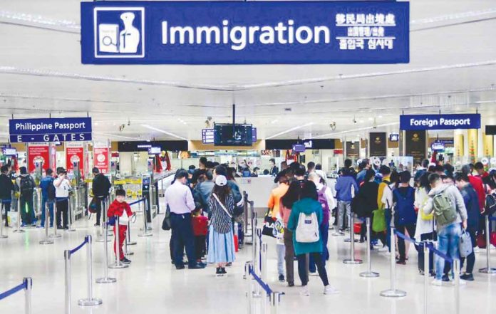 tourist-arrivals Foreign travelers reached 2,397,919 as of Dec. 15, 2022. Department of Tourism, meanwhile, seeks to attract 4.8 million visitors in 2023. Photo shows passengers arriving at the NAIA Terminal 1. MARK DEMAYO/ABS-CBN NEWS FILE PHOTO
