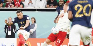 Kylian Mbappe (#10) of France shoots to score in the FIFA World Cup Qatar Round of 16 game against Poland at Al Thumama Stadium in Doha, Qatar on Dec. 4, 2022. CFP PHOTO