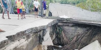 A bridge approach collapsed in Hamtic, Antique, on Tuesday, Jan. 17. The Municipal Disaster Risk Reduction and Management Office said the heavy rains may have eroded the soil under the structure, causing it to collapse. LEO PATRICK RIZARDO FACEBOOK PHOTO