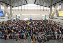 Thousands of people are stranded at the Ninoy Aquino International Airport in Pasay, Metro Manila on January 1, 2023 after a technical glitch in the country’s air traffic system left hundreds of flights to be cancelled, delayed or diverted.