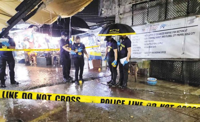 Super Photo shows the area at the Iloilo Terminal Market where fish vendor Melvin Roque was shot to death early morning of Thursday, Jan. 12. ICPO PHOTO