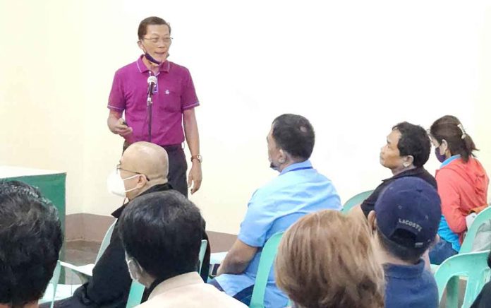 abattoir-1 Engineer Romeo Andig, head of the Iloilo Provincial Engineer’s Office, leads the pre-construction conference for a double A abattoir in Oton town. The project has a contract amount of P52,099,978.56. Right photo shows the site development plan. ILOILO PROV’L ENGINEER'S OFFICE FACEBOOK PAGE PHOTO