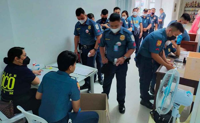 drug-test Forty-seven policemen of the Iloilo City Police Office submit urine samples for drug testing on Sunday, Jan. 8, 2023. ICPO PHOTO