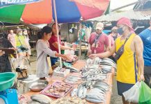 Higher power, fish, meat prices may affect March inflation – BSP Residents buy fish at a stall in Pavia Public Market. AJ PALCULLO/PN