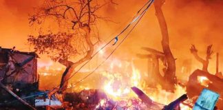 Barangay West Habog-Habog in Iloilo City’s Molo district turns fiery red as fire razes a vast neighborhood of informal settlers before dawn on Saturday, Jan. 28. ILOILO CITY DRRMO PHOTO