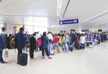 Travelers queue at the Ninoy Aquino International Airport immigration counters. TOURISM.GOV.PH PHOTO