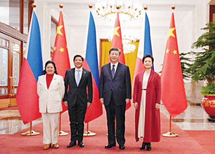nation-PH The Philippines’ President Ferdinand “Bongbong” Marcos Jr. and first lady Liza Araneta Marcos are photographed with China President Xi Jinping and his wife Peng Li Yuan during a welcoming ceremony at the Great Hall of the People in Beijing, China, Jan. 4, 2023. OFFICE OF THE PRESS SECRETARY / HANDOUT VIA REUTERS