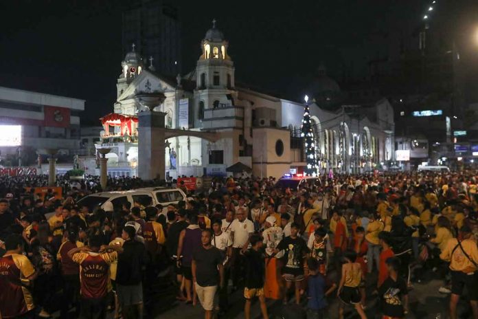 nation-quiapo EARLY CROWD. Devotees fill Quezon Boulevard in Quiapo, Manila early Sunday (Jan. 8, 2023), a day before the Feast of the Black Nazarene. After a Mass at the Quirino Grandstand past midnight, they joined the “Walk of Faith” in lieu of the Traslacion, or the transfer of the life-size Nazarene replica to the Quiapo Church. PNA PHOTO BY YANCY LIM