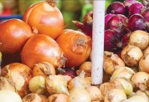 Onions go for sale in a market in Manila. MARK DEMAYO/ABS-CBN NEWS PHOTO