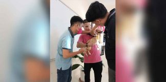 Dr. Darel Tabuada, head of the Iloilo Provincial Veterinary Office, teaches a vaccinator from Cabatuan town how to properly inject the rabies vaccine. OFFICE OF THE PROVINCIAL VETERINARIAN-ILOILO FB PAGE PHOTO