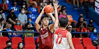 Heinz Gabriel “Kobe” Demisana is a 6-foot-8 gentle giant. UAAP PHOTO