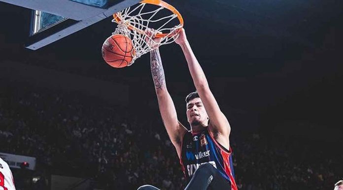 sports-kai-sotto Kai Sotto of the Adelaide 36ers with a two-handed dunk. NBL PHOTO