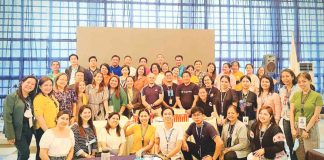 Ruel Von D. Superio (center, wearing black shirt) and employees of the Provincial Population Office in a general conference recently. RUEL VON D. SUPERIO PHOTO