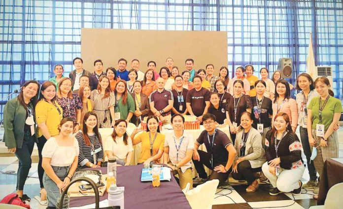 PPO head Ruel Von D. Superio (center, wearing black shirt) and employees of the Provincial Population Office in a general conference recently. RUEL VON D. SUPERIO PHOTO