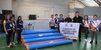 Office of Civil Defense Region 6 director Jose Roberto Nuñez turns over disaster response aid to the Roxas City government. RONNIE DADIVAS FB