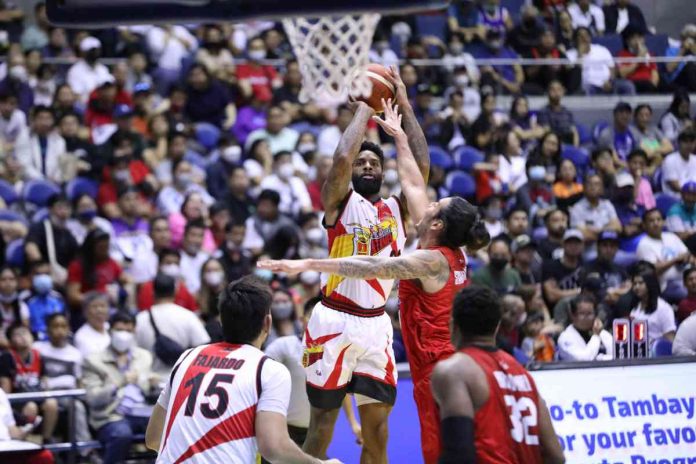 sports san San Miguel Beermen’s Cameron Clark pulls up for a basket while being defended by Barangay Ginebra San Miguel Kings' Christian Standhardinger. PBA PHOTO