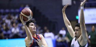 Rain or Shine Elasto Painters’ Leonard Santillan attempts a one-hander while being defended by Terrafirma Dyip’s Javi Gomez de Liano. PBA PHOTO