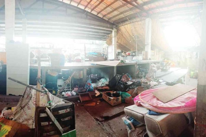 Twenty-five shanties, or hayob-hayob, were demolished yesterday after the Philippine Drug Enforcement Agency (PDEA) dismantled an alleged drug den at the Vendors’ Plaza in Bacolod City on Monday. MAE SINGUAY