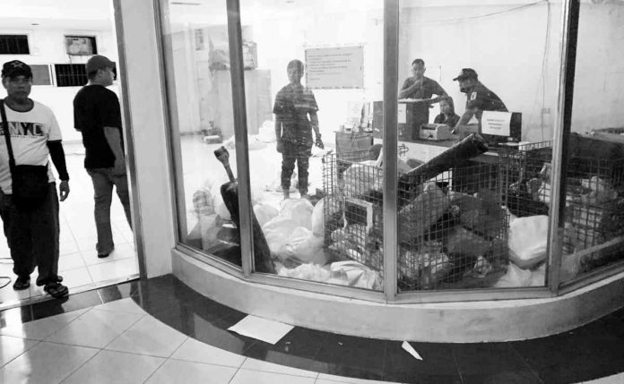 J&T office Three armed men robbed the office of J&T Express in Barangay Quintin Salas, Jaro, Iloilo City on Wednesday night, March 1. Photo shows the express courier company’s delivery hub. RADYO BANDERA ILOILO PHOTO