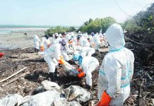 Semirara Mining and Power Corporation Emergency Response Team (SMPC ERT) and Barangay Semirara responders are working together to clean up and contain the Mindoro oil spill that reached Semirara Island.