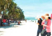 China reopens to Filipino tourists Tourists enjoy the world-renowned Boracay Island. China already allowed outbound group travel for Chinese citizens to more than a dozen countries, including the Philippines, reviving hopes for the pandemic-hit tourism sector. PNA FILE PHOTO