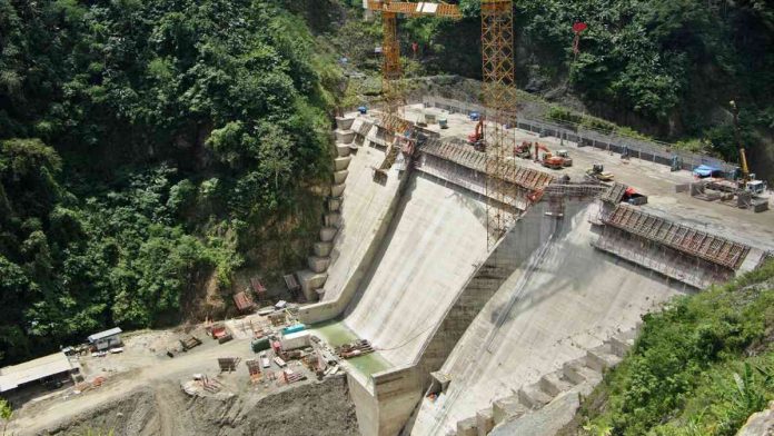 dam1 The 109-meter high dam of the Jalaur River Multi-purpose Project II is expected to be completed by December this year. Photo shows the ongoing construction of the high dam which is now 73.1 meters high. NIA-6 PHOTO
