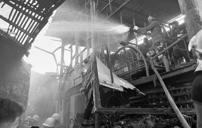 fire pic Eight houses were totally damaged and three were partially burned by a fire in Barangay Muelle Loney, City Proper, Iloilo City on Wednesday afternoon, March 29. AJ PALCULLO/PN