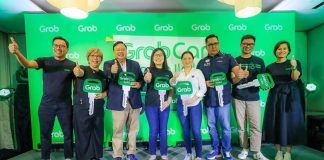 Mayor Jerry Treñas (fourth from left), Grab Philippines Country Head Grace Vera Cruz (fifth from left), Iloilo City Rep. Julienne Baronda (fifth from right),, and LTFRB-6 regional director Richard Osmeña (fourth from right) with local oficials and department heads of Iloilo City. Mayor Jerry Treñas