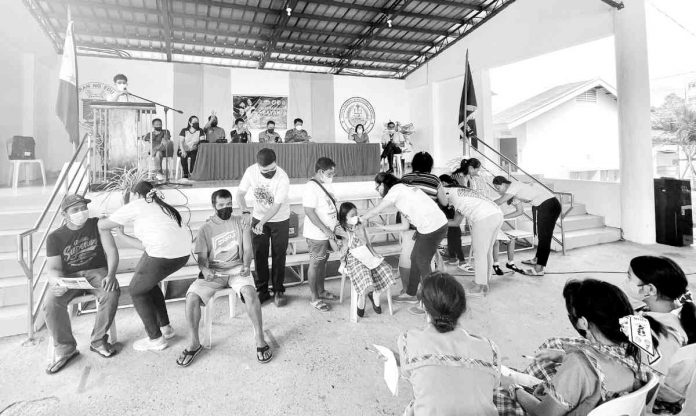 health workers Health workers in Iloilo province expressed excitement over the bivalent vaccines against coronavirus disease 2019 as it could provide more protection. Photo shows health workers inoculating residents from Leon town. CONTRIBUTED PHOTO