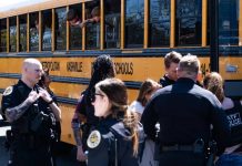 3 kids, 3 adults shot at US school Photo courtesy of Seth Herald/Getty Images