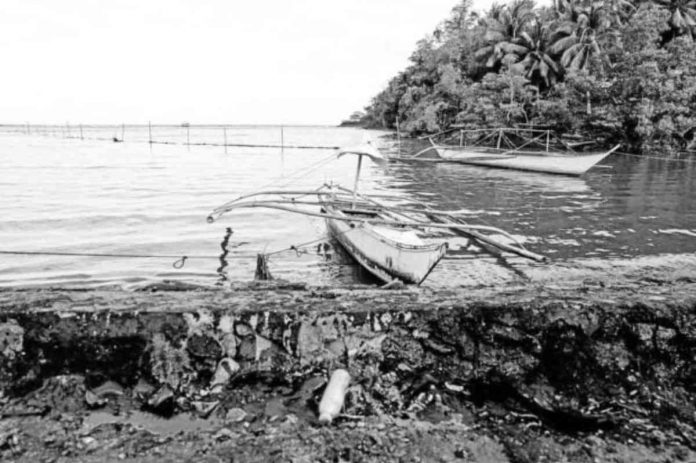 nation senate DESERTED. Fishing boats are left idle along the shoreline of Pola, Oriental Mindoro in this photo taken on Thursday, March 9, 2023, following the widespread oil spill that affects the livelihood of local fishermen. PHOTO COURTESY OF NOEL GUEVARA OF GREENPEACE