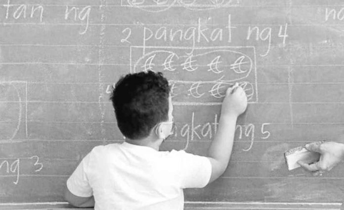 nation students A teacher and her students learn together at the Pedro Cruz Elementary School in San Juan City as it reopened its face-to-face classes. The school passed the DepED Schools Safety Assessment Tool which shows its readiness for the limited face-to-face learning modality. File photo by GRIG C. MONTEGRANDE / Philippine Daily Inquirer