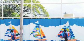 This wall along a street in Iloilo City is painted with colorful paraws just in time for the celebration of the 50th year of the Paraw Regatta Festival, the oldest sailing competition in the country. ARNOLD ALMACEN PHOTO