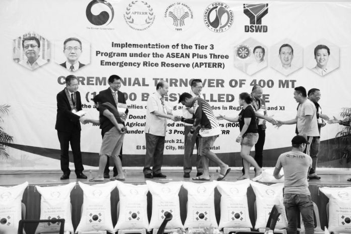 rice Officials of the Department of Agriculture (DA) meet milled rice beneficiaries on March 21, 2023 as the Ministry of Agriculture, Food, and Rural Affairs of South Korea delivered aid to disaster-affected families in Misamis Oriental. DA-AFID PHOTO